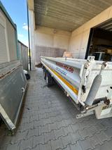 Möslein Dreiseiten-Tandemkipper mit Bagger Auffahrrampen - Gebraucht Bagger