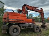 Doosan DX160W VA *2012/10680H/Blade/outriggers/bucket* - Doosan Mobilbagger Dx w 160