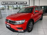 Volkswagen Tiguan 1.4 Comfortline *Pano*Navi*SHZ*RFK*AHK*BT - mit Benzin-Antrieb: Orange, Geländewagen