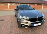 BMW X6 M50d Scheckheftgepflegt bei BMW. In einem top - graue BMW X6 M50