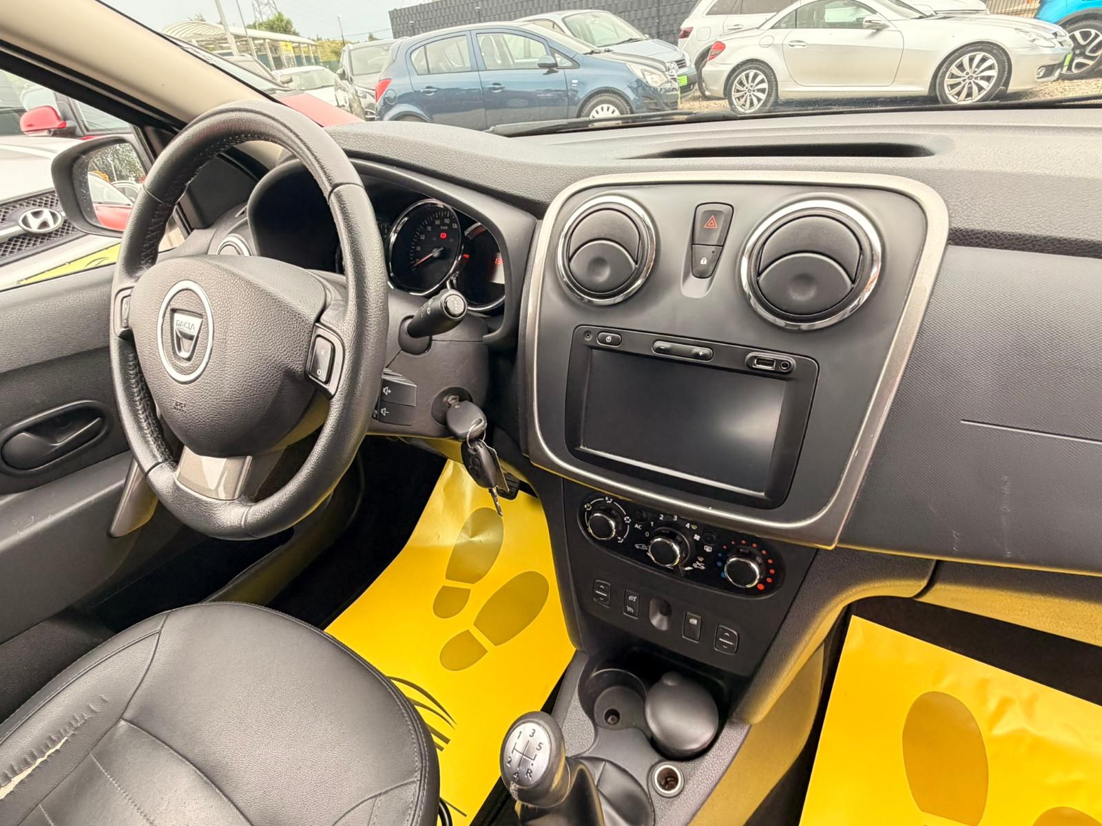 Dacia Logan 2014 — photo 8