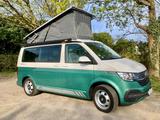 Volkswagen T6.1 California *Aufstelldach + 2 Schiebetüren* - VW T6 California in Freiburg