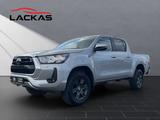Toyota Hilux Double Cab Comfort 4x4*AHK*NAVI*SAFETY* - gebrauchte Toyota Hilux aus dem Jahr 2024