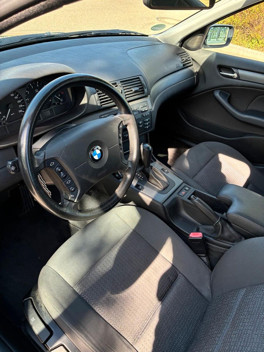BMW 318 2005 — photo 14