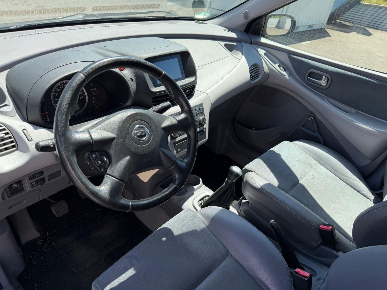 Nissan Almera 2005 — photo 34