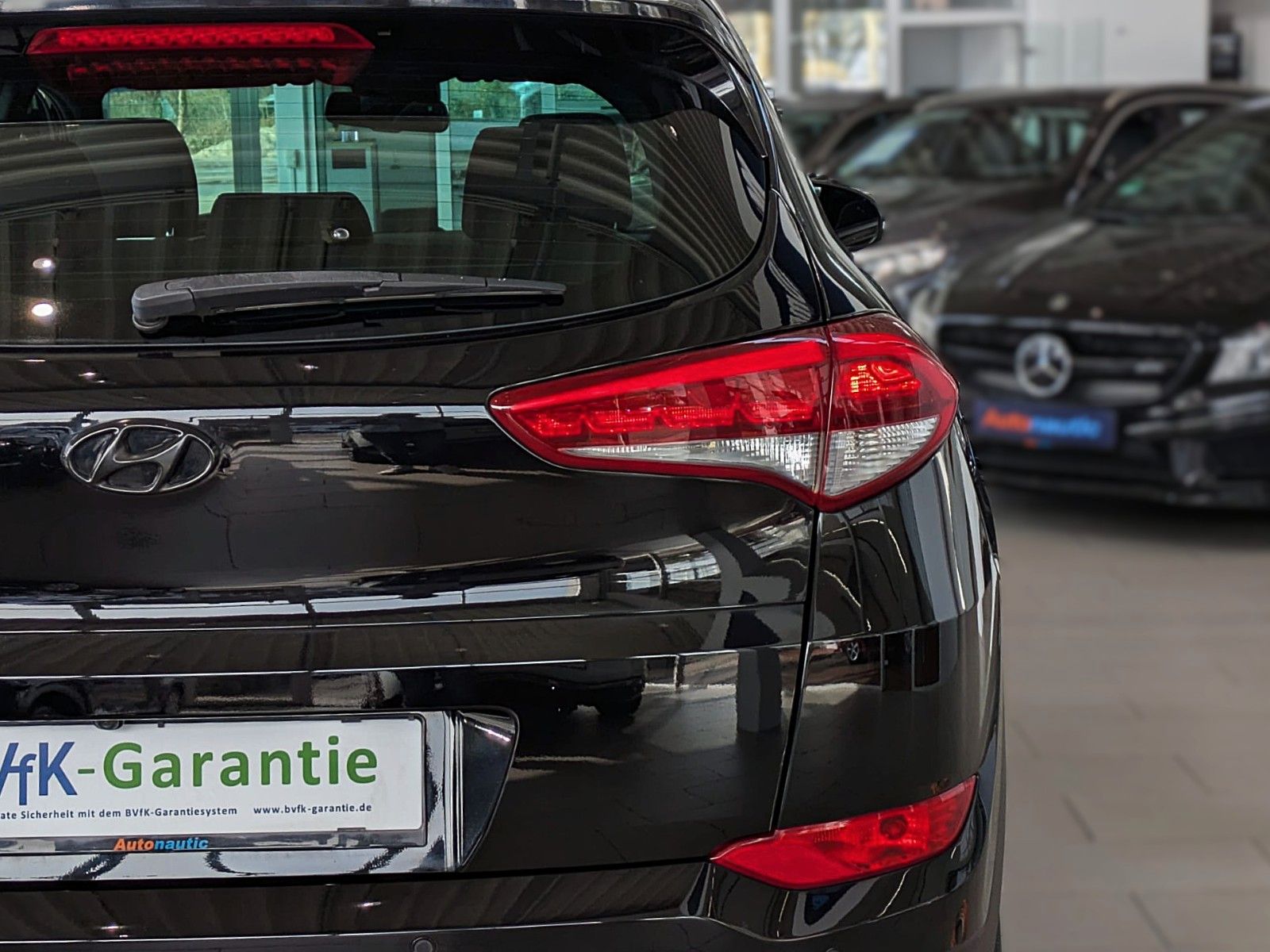Fahrzeugabbildung Hyundai TUCSON 1.6i DTC PASSION SITZHZ ANDROID NAVI CAM