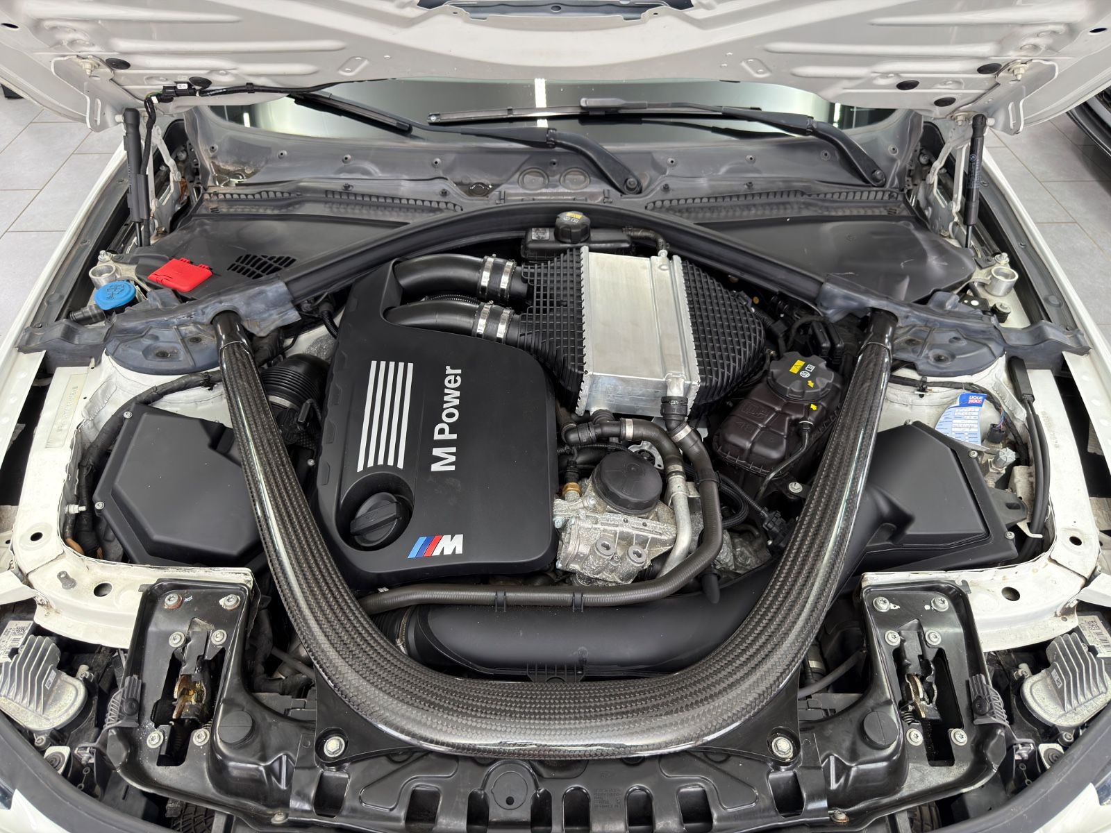 Fahrzeugabbildung BMW M4 Coupe DKG|NAVI|DEUTSCHES FAHRZEUG|LCI