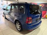 Volkswagen Touran 1.4 TSI*TÜV NEU*2.HAND*ALU*PDC*S-HEFT - Volkswagen Touran mit Benzin-Antrieb: Kleinbus