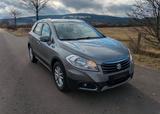 Suzuki SX4 SHZ, ZV, Keyless 8 Fach bereift AHK TÜV neu - gebrauchte Suzuki SX4 aus dem Jahr 2015