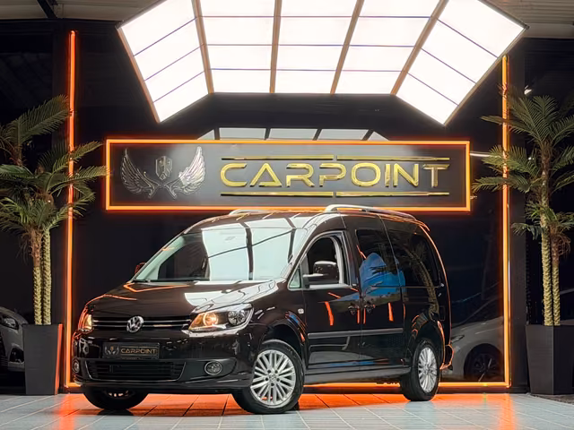 Volkswagen Caddy Maxi Kombi / Navi /7-Sitzer/Rollstuhl-Kran