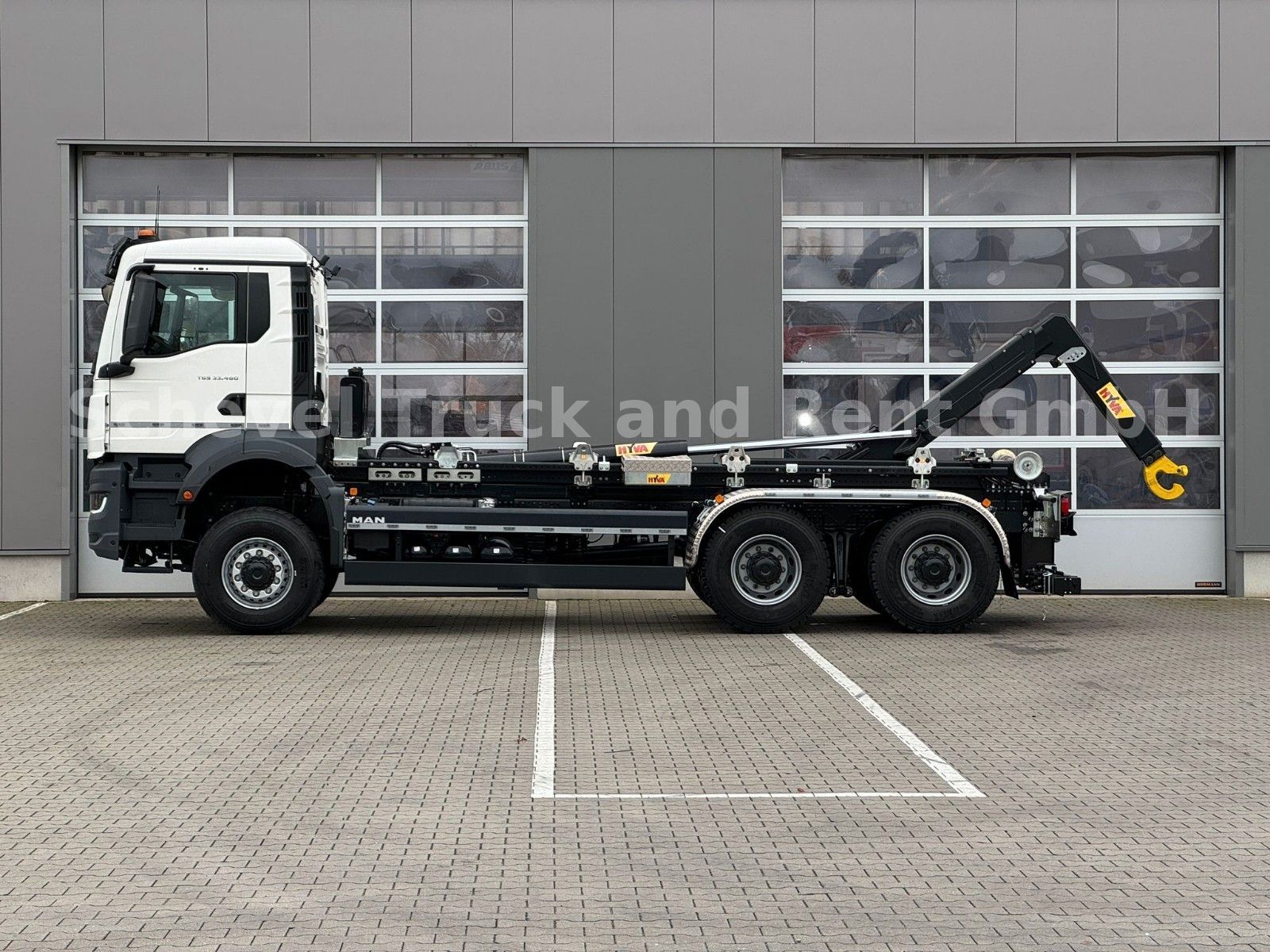Fahrzeugabbildung MAN TGS 33.480 Abrollkipper HYVA  / 26-55s 6x6/60Ton