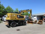 CAT M 318 F Schnellwechsler, Reifen neu , 3xSchaufel - Angebote