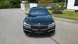 BMW M760Li - Schwarz / Fionarot - BMW M760 Gebrauchtwagen