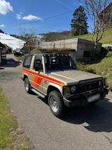 Mitsubishi Pajero 2.6 L042 Tausch - Mitsubishi Pajero mit Benzin-Antrieb: Geländewagen, 2.0