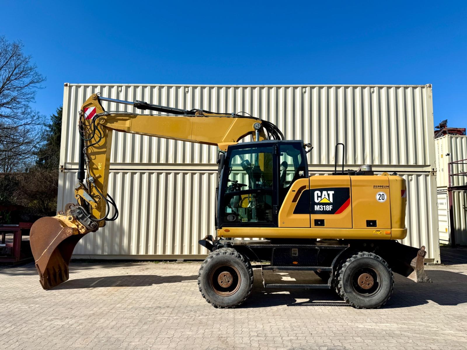 CAT M318F / 9.852 H / Deutsche Maschine