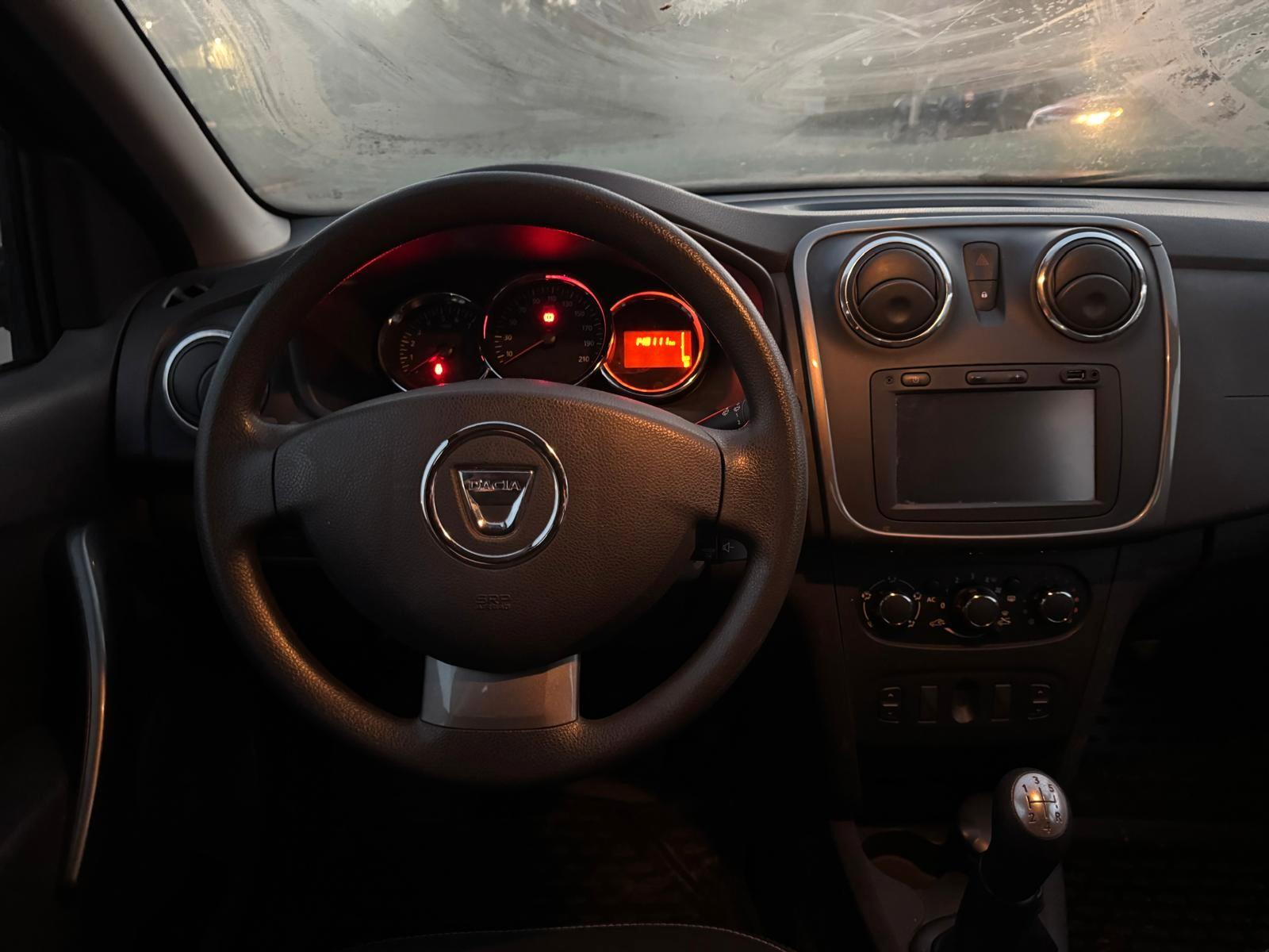 Dacia Logan 2014 — photo 12