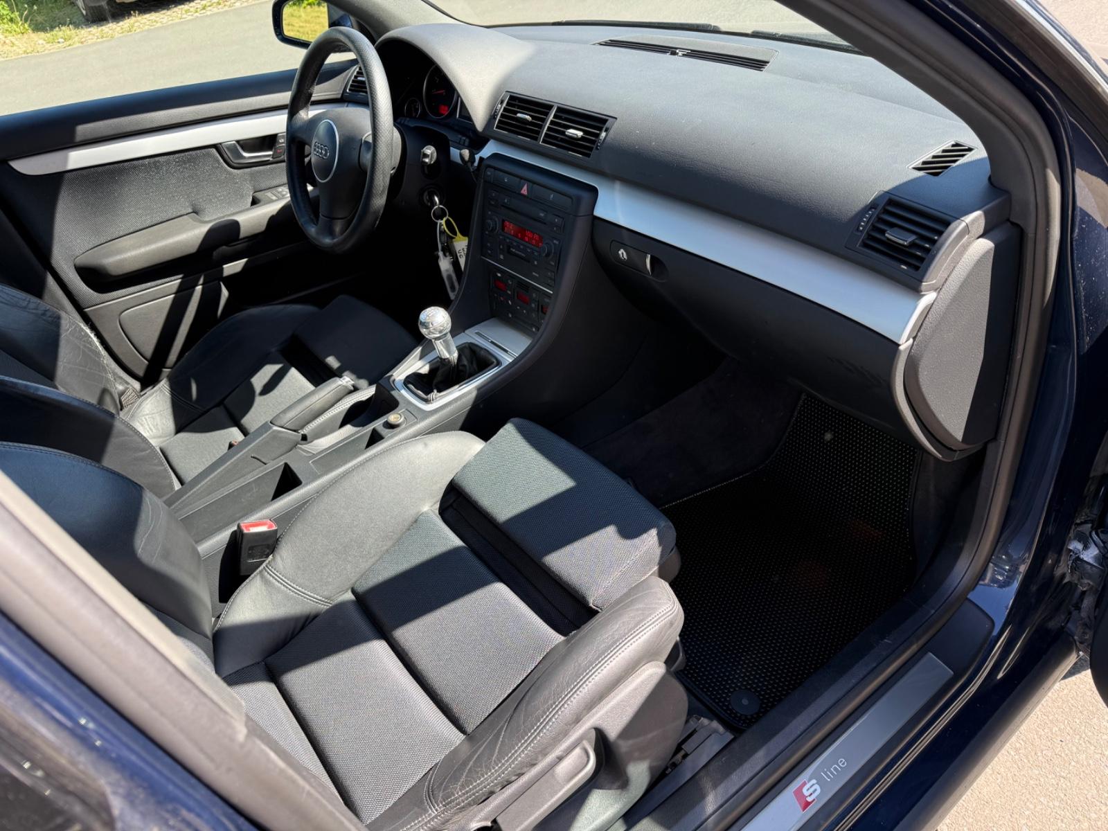 Audi A4 2004 — photo 14