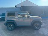 Suzuki Jimny Comfort+ AllGrip/Navi/Shz/4Sitzer - Suzuki Gebrauchtwagen in Mannheim