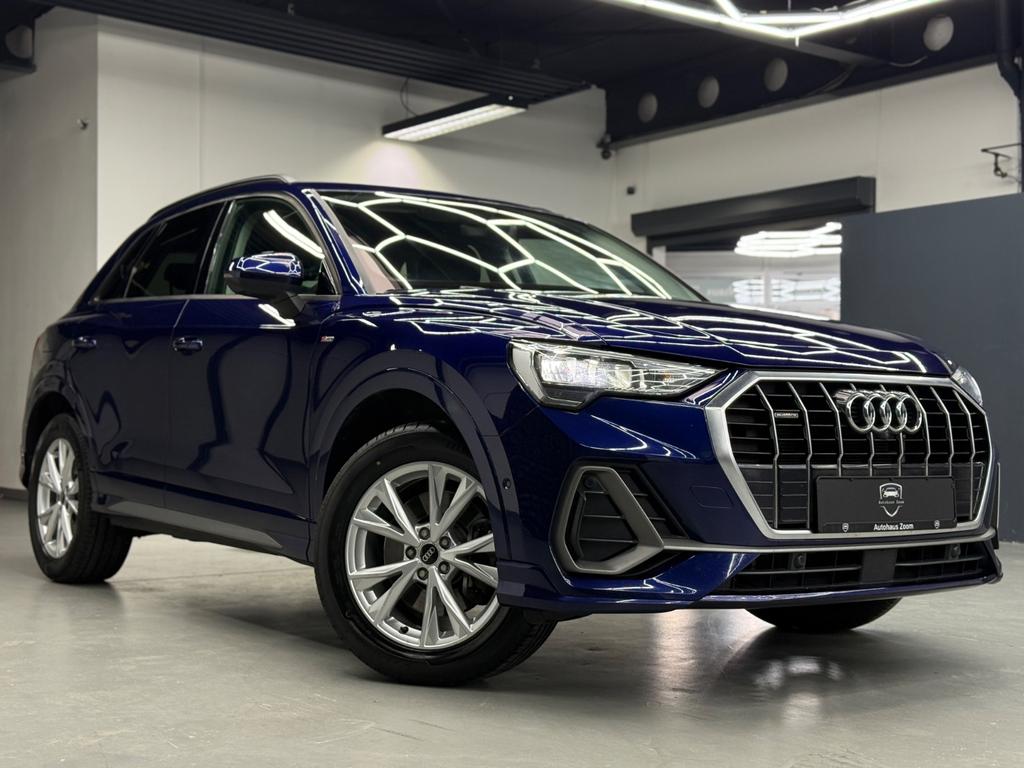 Audi Q3 40 TDI quattro S line, Foto 12 von 50