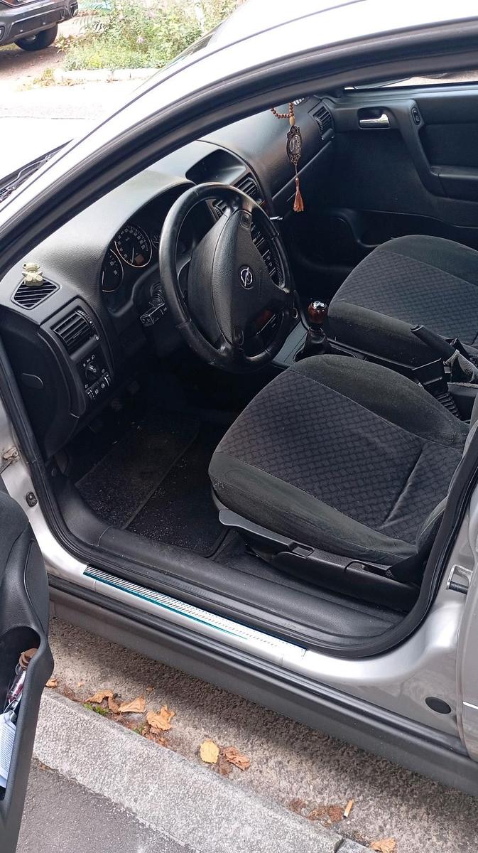 Opel Astra 2004 — photo 7