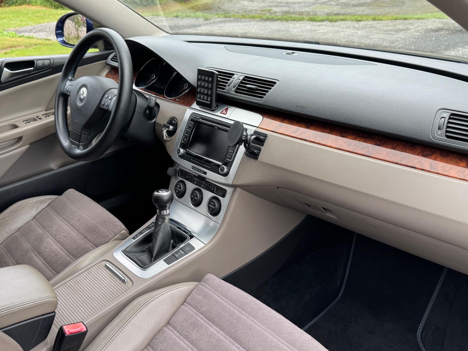 Volkswagen Passat 2009 — photo 22