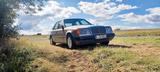 Mercedes-Benz W124 260E Oldtimer - graue Mercedes-Benz 260