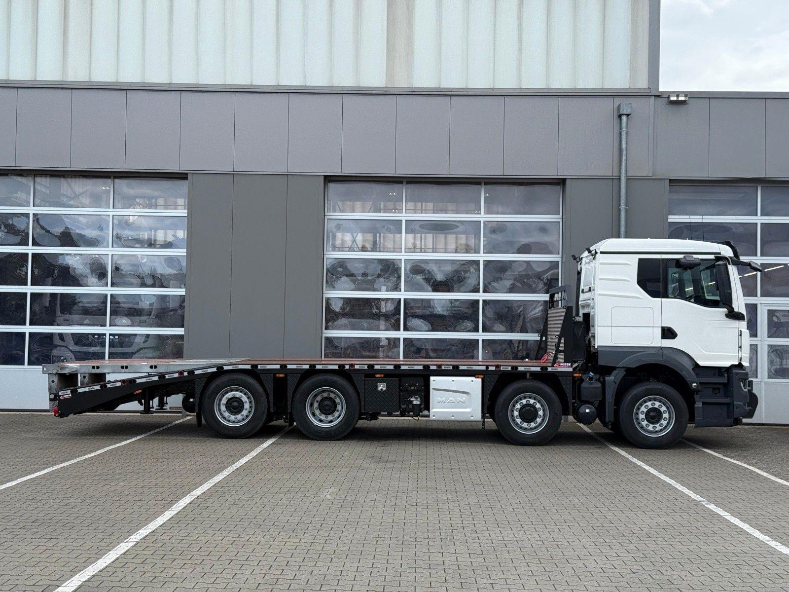 Fahrzeugabbildung MAN TGS 35.520 8x2H Maschinentransporter Funk* Seil*