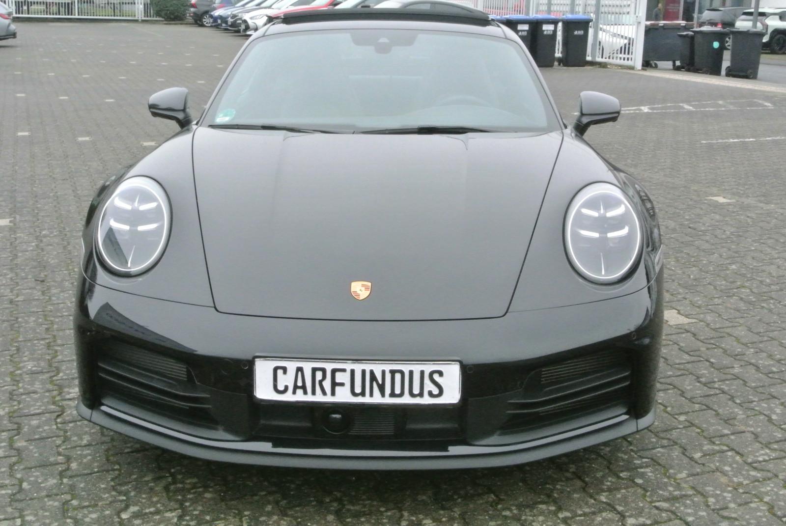 Porsche 992,schw/schw,abgas,bose,21",glasd,14 wege,sofor