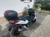 SYM city com - SYM MOTORRAD