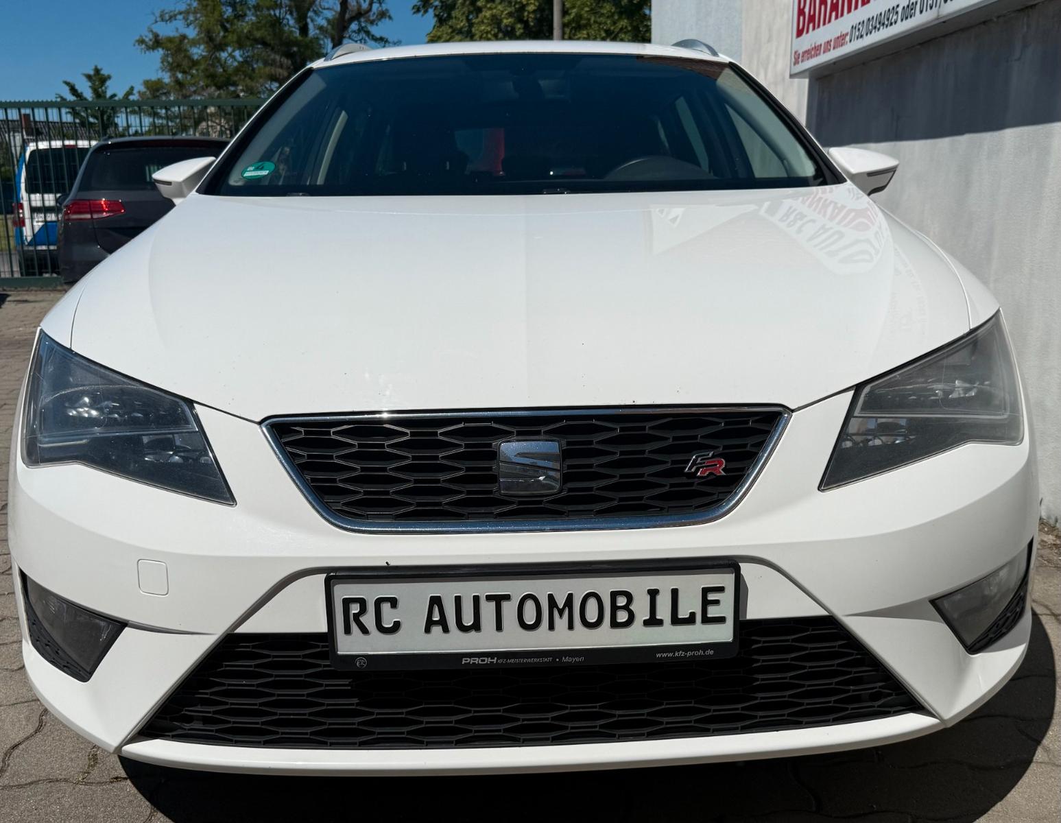 Seat Leon 2014 — вигляд ззаду