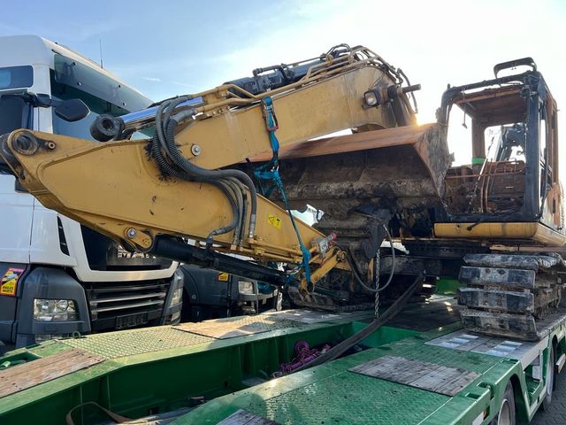 CAT Cat 311 D  LLR Gummiketten und Schild Brandschad