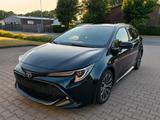 Toyota Corolla 2,0 Hybrid Team Deutsch Touring Spor... - Toyota Corolla Gebrauchtwagen in Bremen