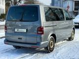 Volkswagen T5 Caravelle 2.0 TDI KLIMA AHK PDC 9-SITZE - Volkswagen T5 Caravelle aus 2013