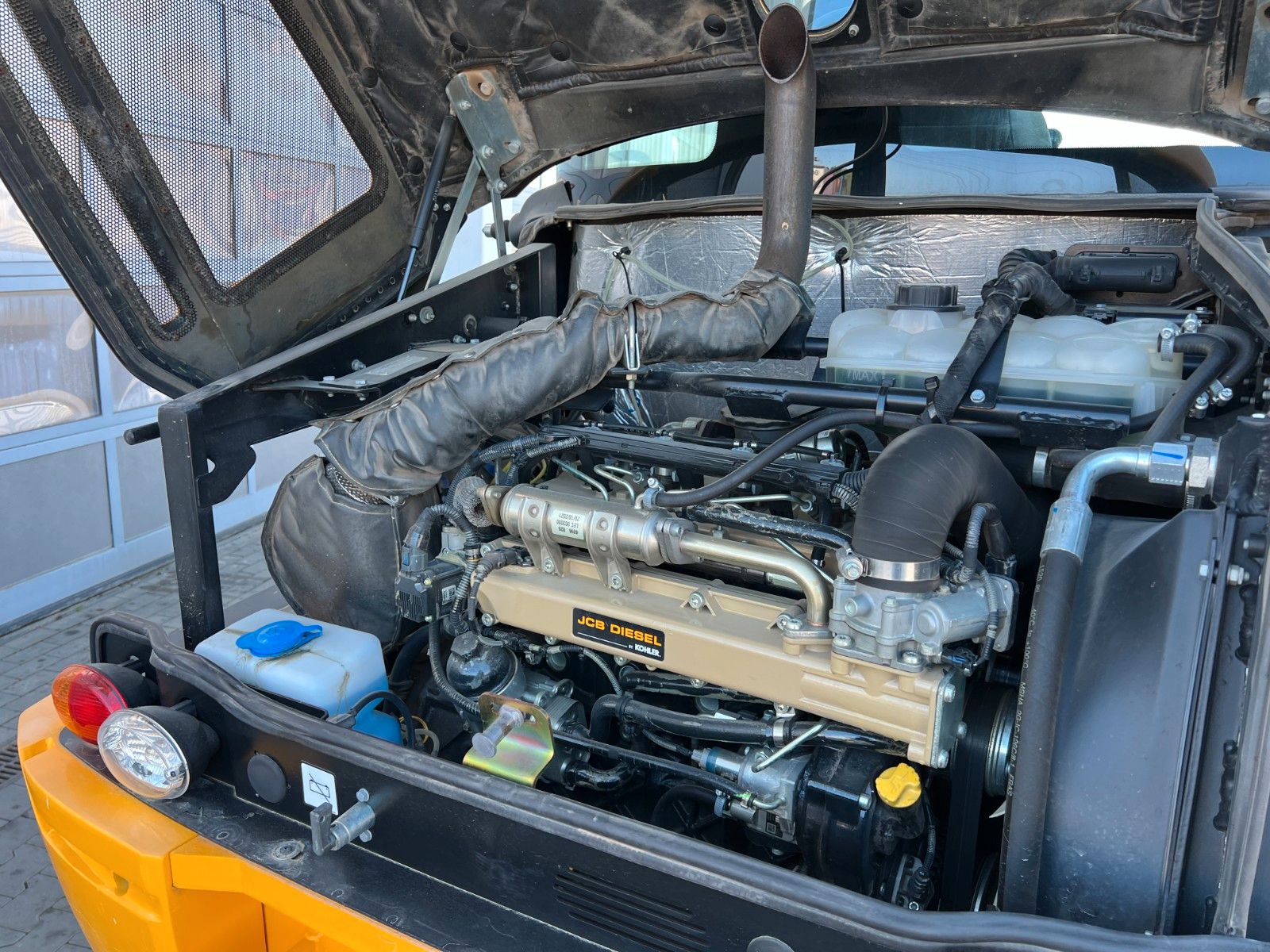 Fahrzeugabbildung JCB 409 SV / nur 758h! / Klappschaufel / Gabel