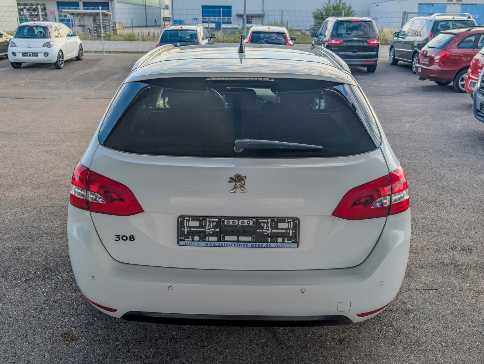 Peugeot 308 2014 — photo 5