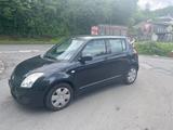 Suzuki Swift Lim. Black and White - Suzuki Swift Gebrauchtwagen in Dortmund