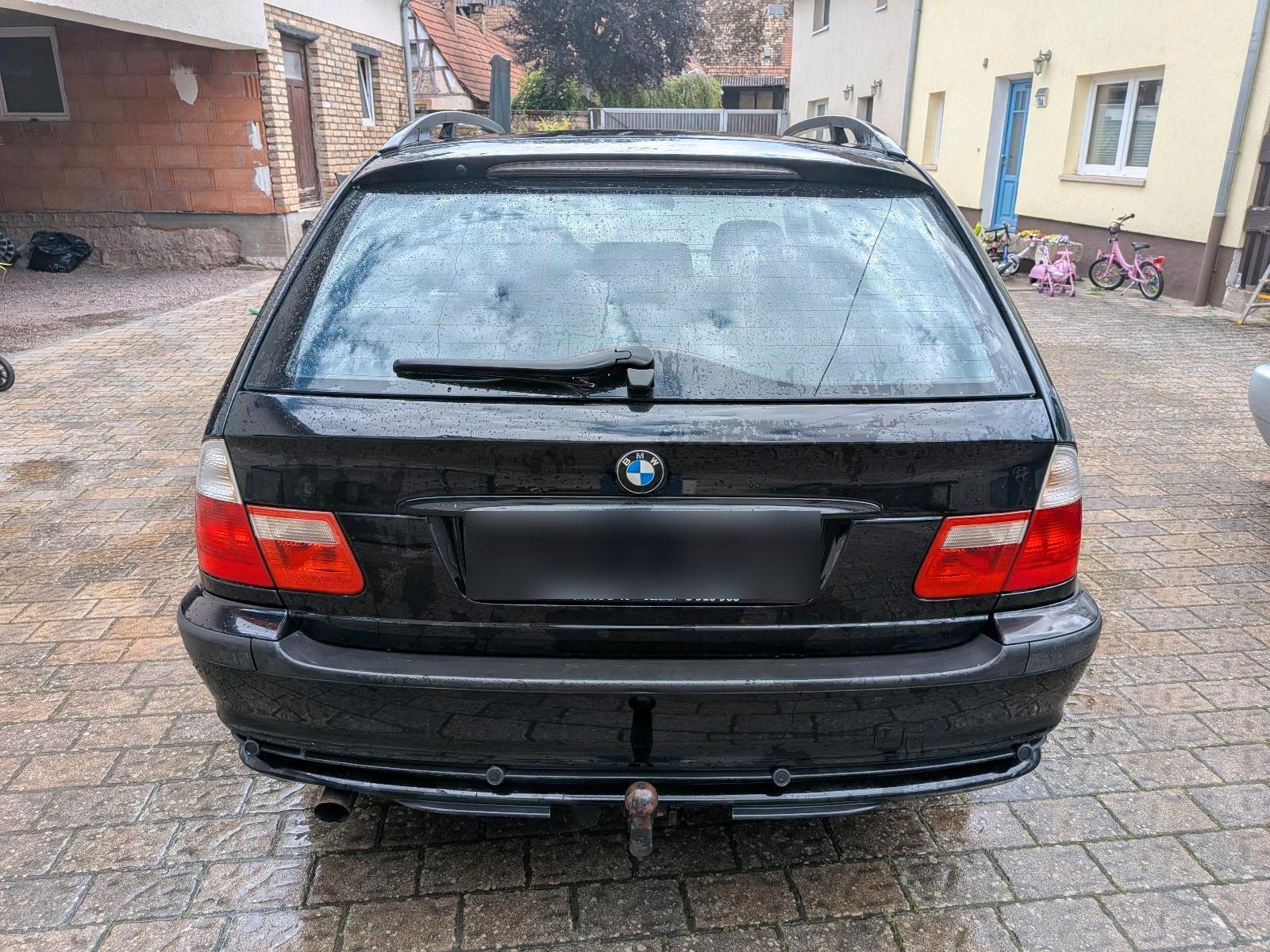 BMW 316 2004 — rear view