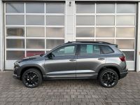 SKODA Karoq 1.5 TSI ACT DSG Sportline PANO AHK 5J GAR bei Autohaus Landmann & Maier OHG