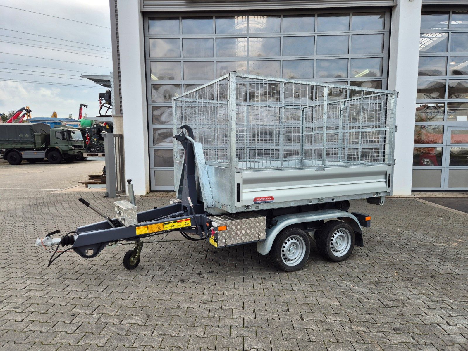 Fahrzeugabbildung Wörmann Abrollkipper Mulde Gitterbox