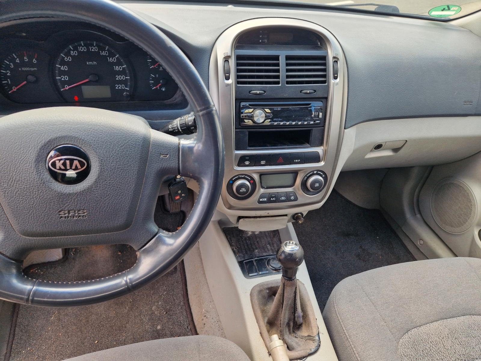 Kia Cerato 2005 — photo 10