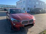BMW X2 sDrive20i M Sport Steptronic DCT M Sport - BMW mit Benzin-Antrieb: Orange