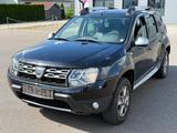Dacia Duster I Prestige 4x4/LEDER/KLIMA/NAVI/TEMPOMAT/ - Dacia Duster aus 2014 mit Diesel-Antrieb: Allradantrieb, Geländewagen