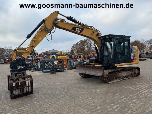 CAT 312 EL mit Greifer