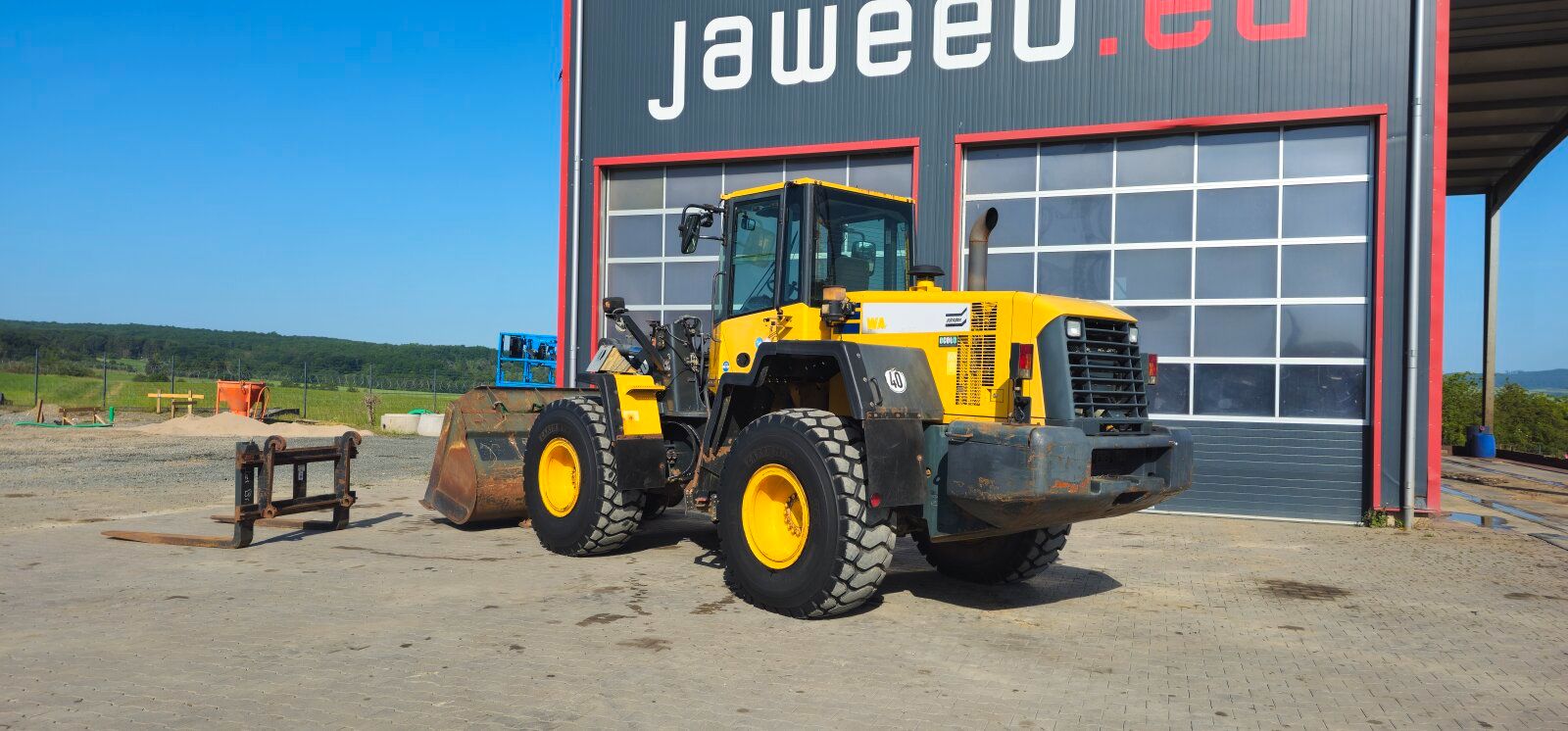 Fahrzeugabbildung Komatsu WA320-6 Schaufel +Gabel +Schnellwechsler/ 7.800