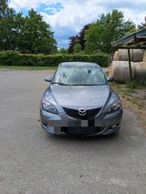 Mazda 3/.  2004 - Mazda aus 2004: Mazda3