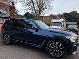 BMW X7 M50i PANO-SKY*M-Sitz*Laser*Sitzkl*AHK*Carbon - blaue BMW X7 M50