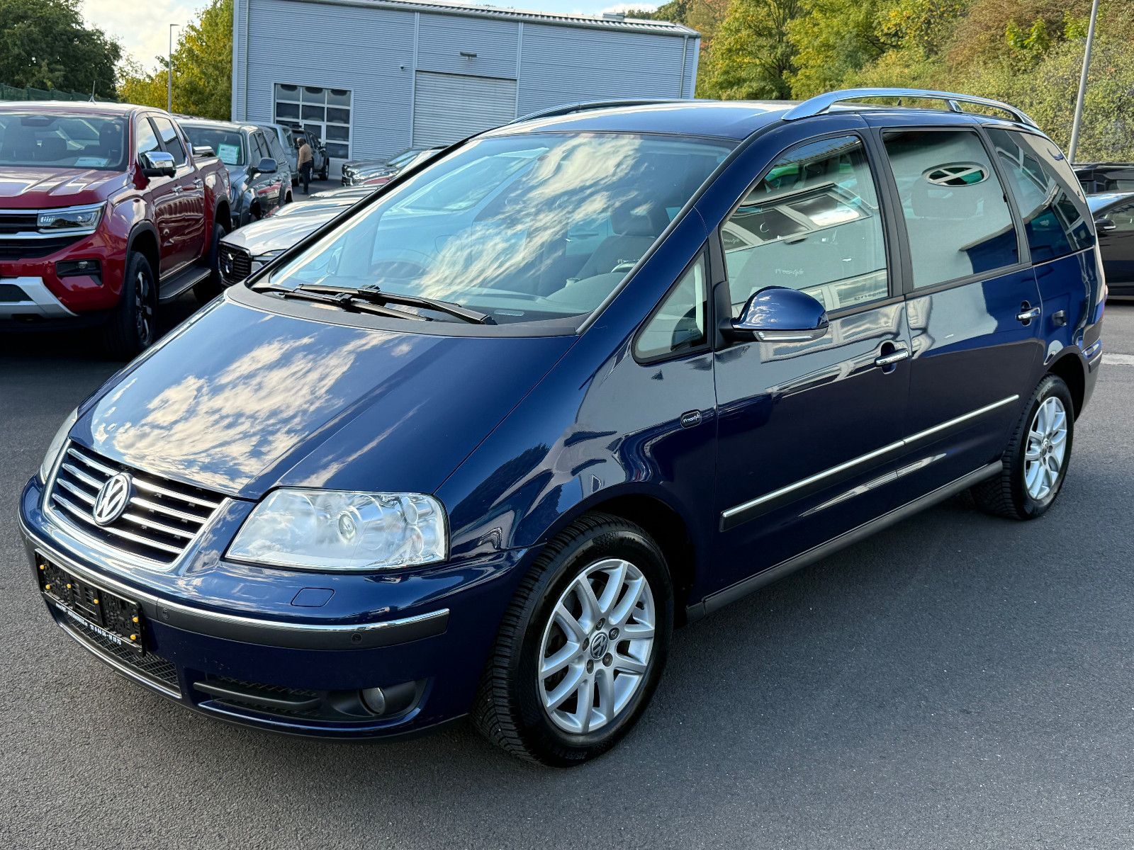 Fahrzeugabbildung Volkswagen Sharan Freestyle TSI DSG GRA Navi Xenon PDC SHZ