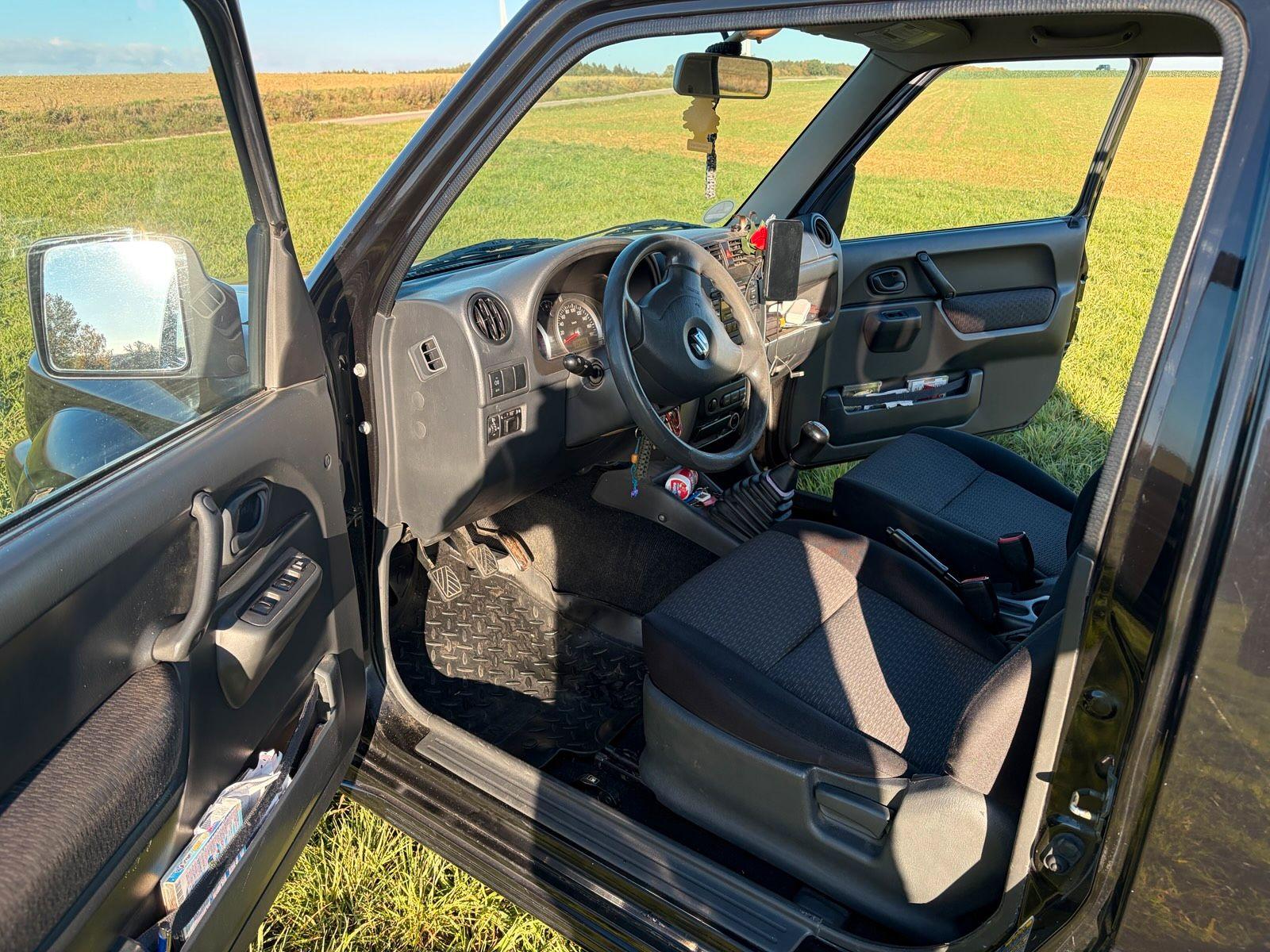 Suzuki Jimny 2006 — engine 86 HP (63kW)
