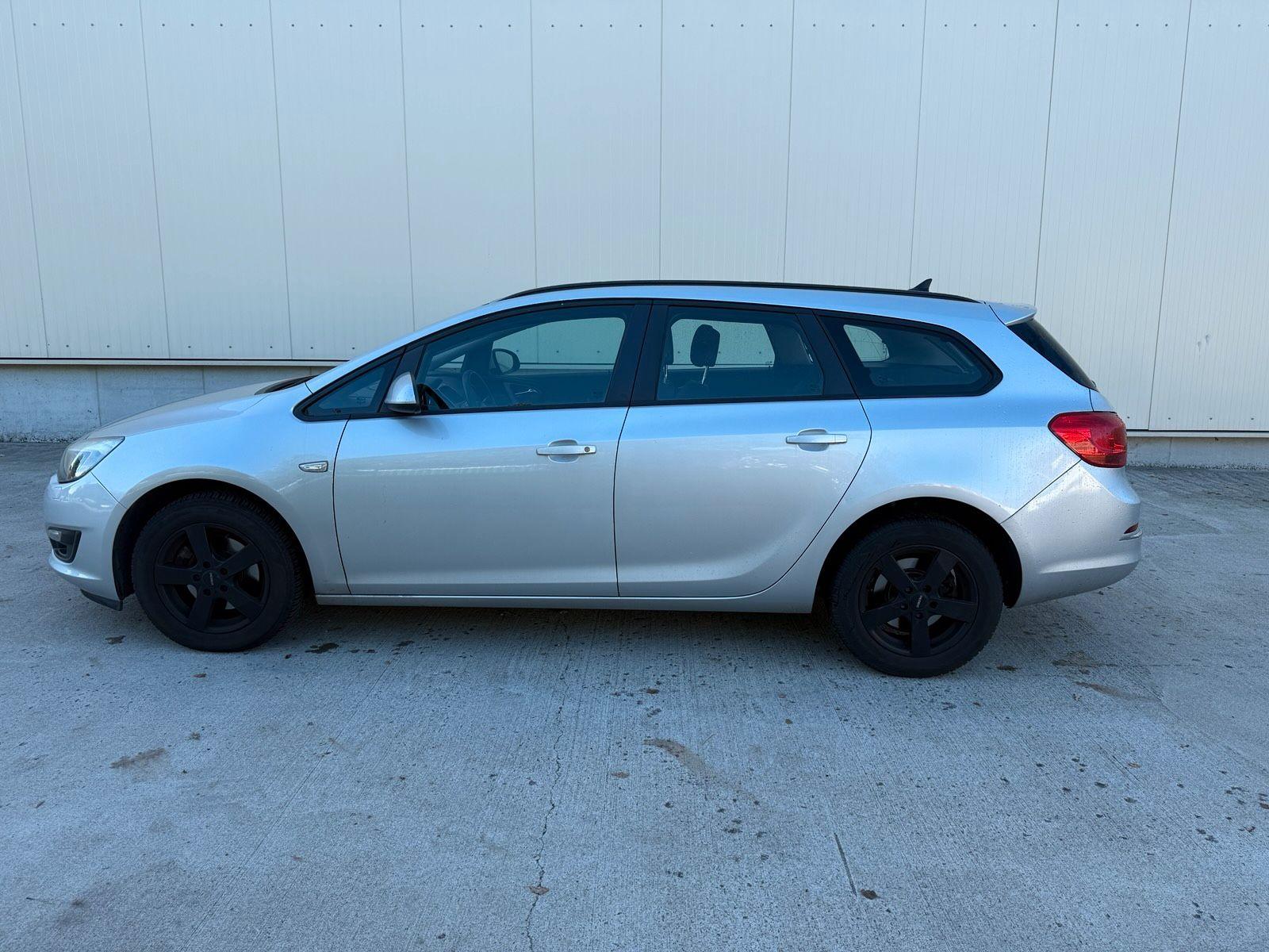 Opel Astra 2014 — engine 102 HP (75kW)
