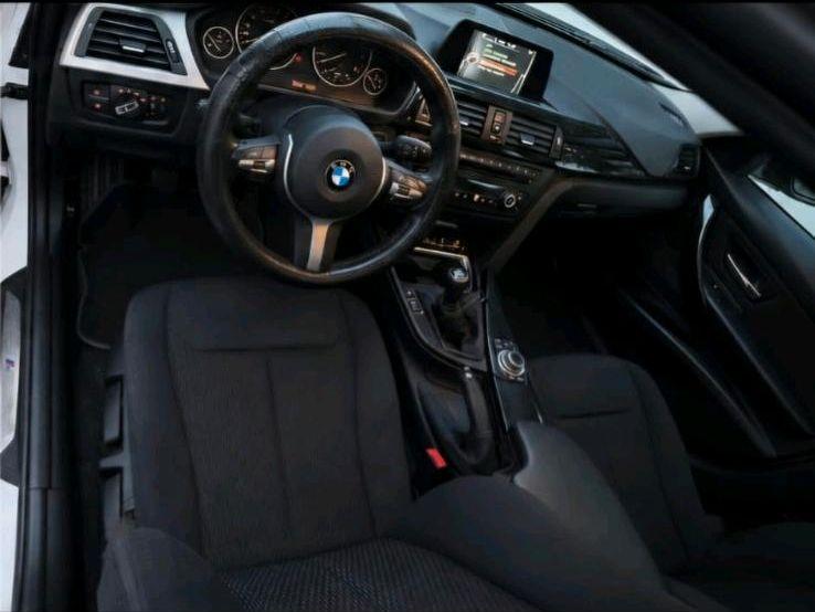 BMW 318 2014 — engine 143 HP (105kW)